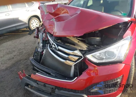 2016 Hyundai Santa Fe Sport 2.4L z USA, uszkodzony, nr VIN 5XYZTDLB7GG371129